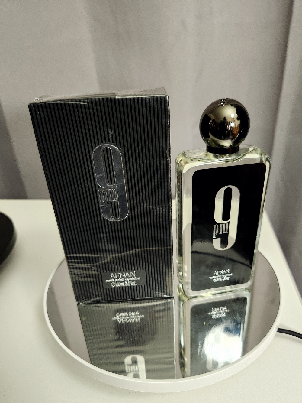 Giorgio Armani 9 PM Bottle in Black and Silver Accents